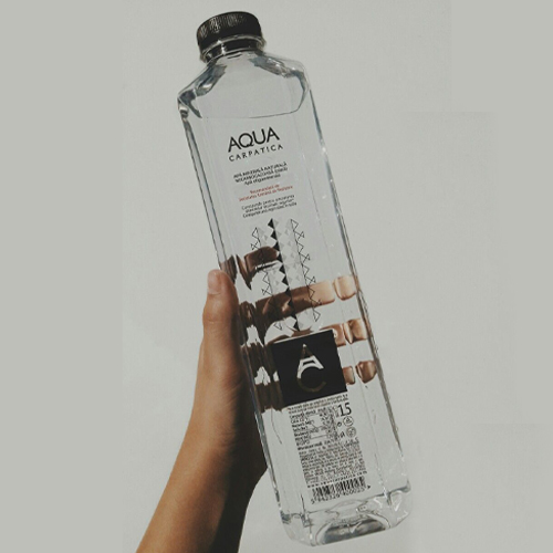 Premium glass water bottle featuring elegant and sustainable packaging