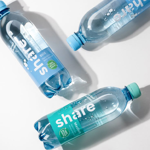 Sustainable water bottle packaging showcasing recycled PET innovation