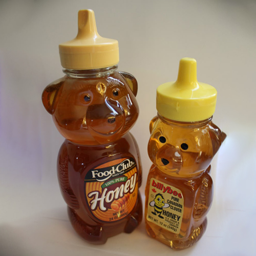 Honey packaging featuring bear-shaped squeeze bottles designed for strong brand recognition and easy dispensing