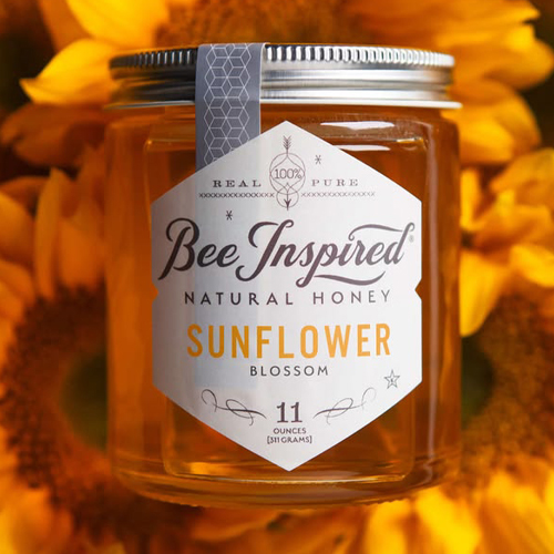 Minimalist Transparent Honey Packaging Featuring Sunflowers