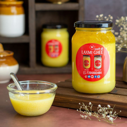 Shelf-ready dairy product packaging displaying attractive branding for milk, paneer, butter, and yogurt.