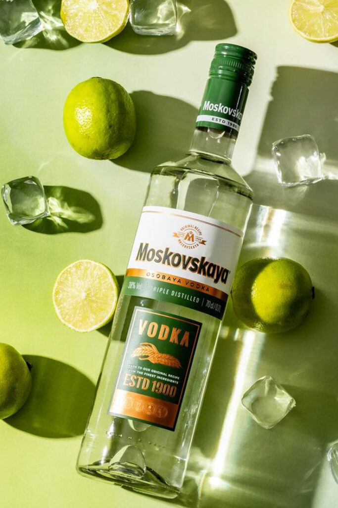 Premium liquor bottle label design with luxury packaging showcase