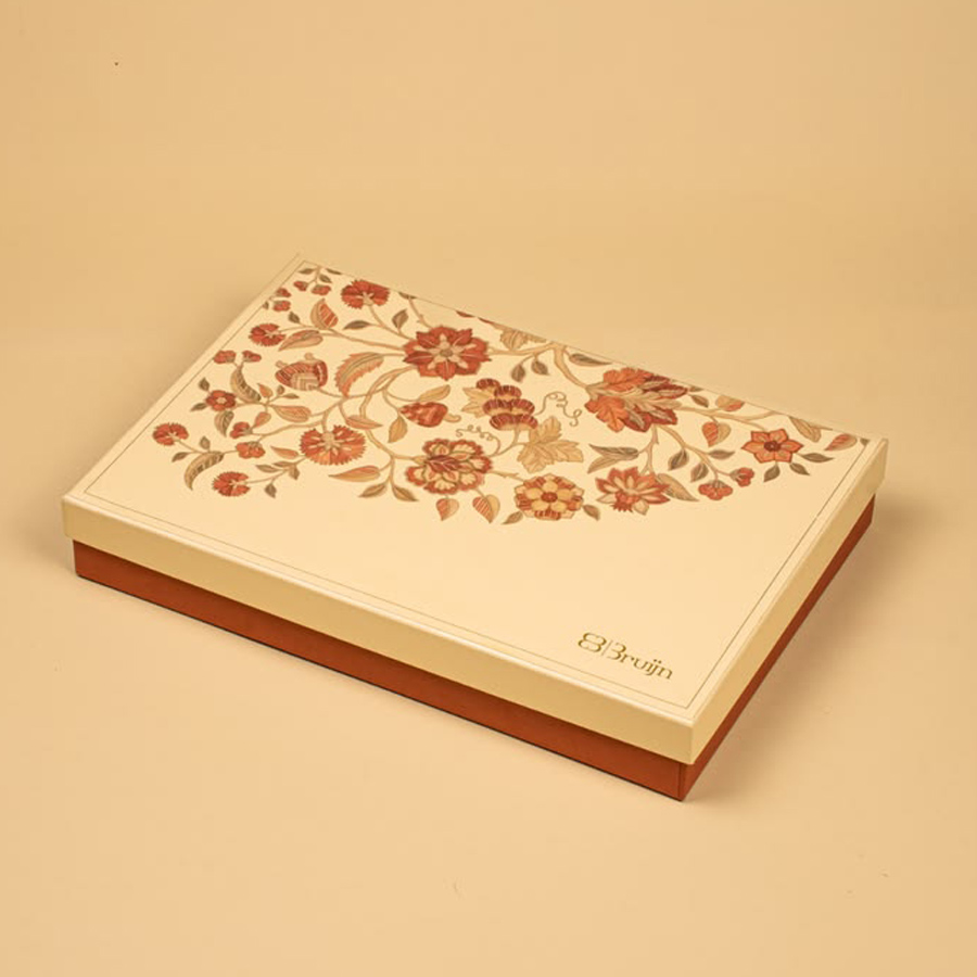 Traditional Indian sweet box packaging design with cultural artwork
