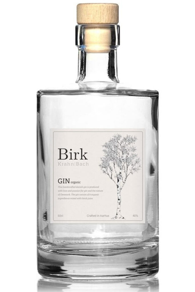 Trnsparent gin bottle showcasing it's minimalist label