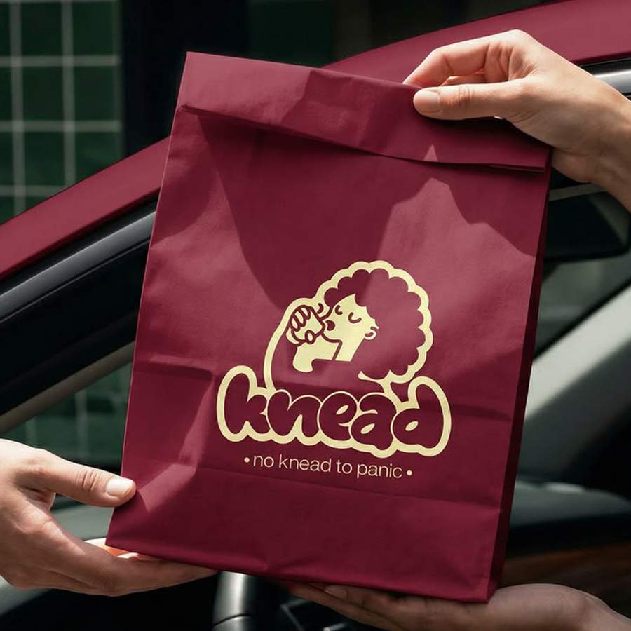 Bakery business barnd logo on baking goods paper carry bag